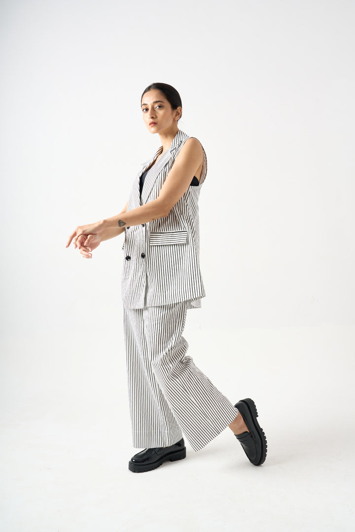 STRIPPED SLEEVELESS BLAZER WITH FRONT BUTTONS AND POCKET DETAILS WITH PANTS