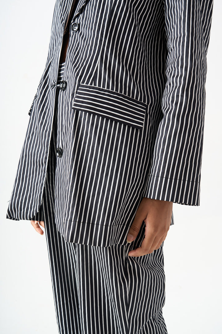 STRIPPED FULL SLEEVES BLAZER WITH FRONT BUTTON AND POCKET DETAILS WITH FLARED BOTTON PANTS