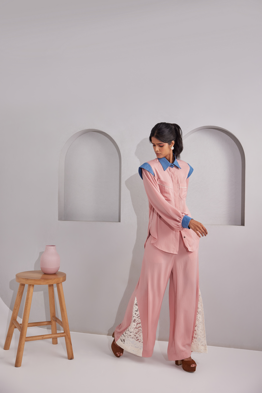 Front button closure, Denim collared shirt with 2 pockets on front, Padded shoulders with denims and balloon sleeves. White net design at the back. Flared pants with netted patches on side bottoms