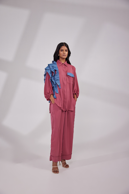 Balloon sleeves shirt having decorative frills on one side and flared pants with pockets