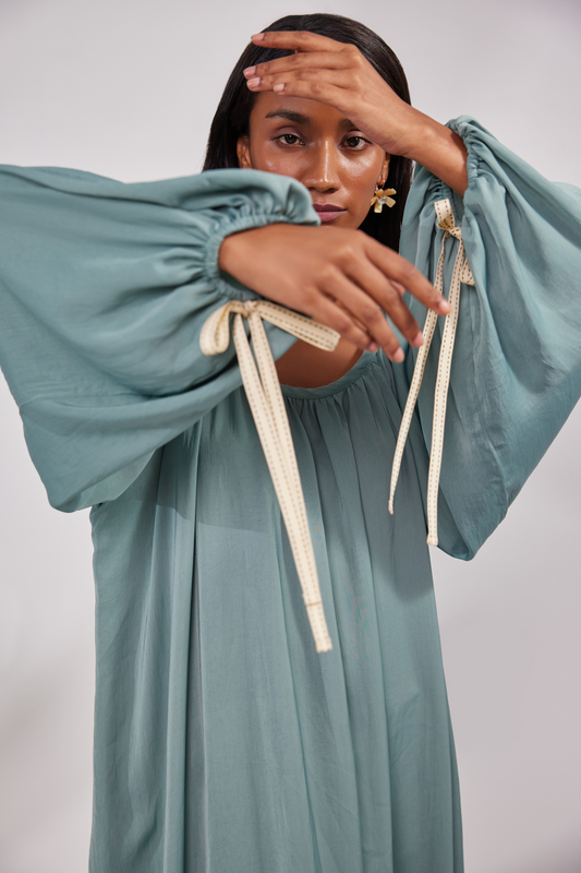 Sleevless maxi dress with full sleeves jacket and 2 pockets on the front